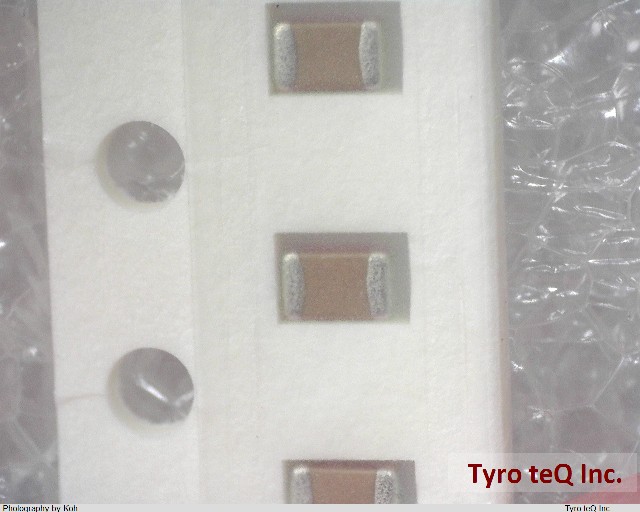 CM21W5R103K50AT