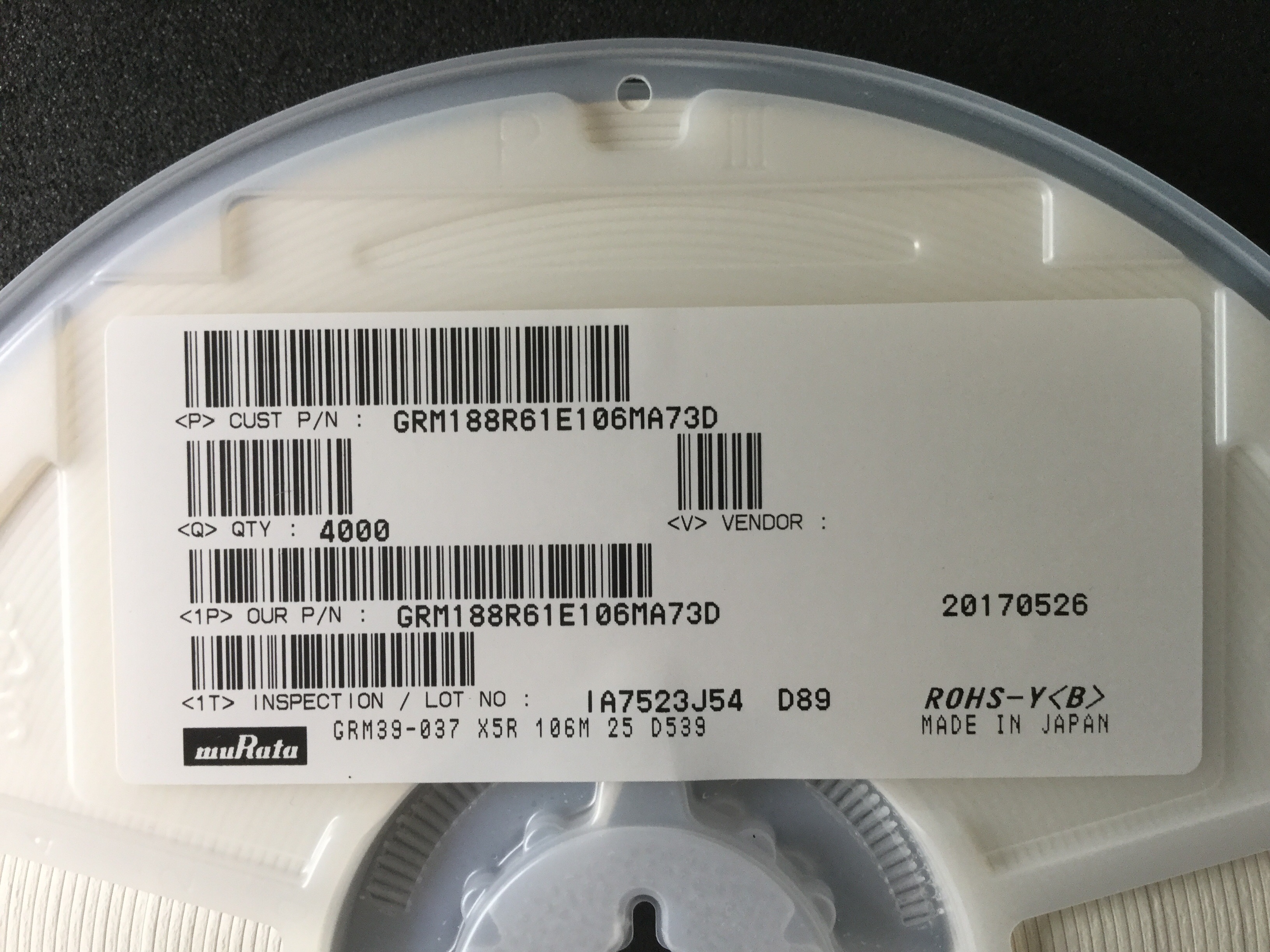 GRM188R61E106M