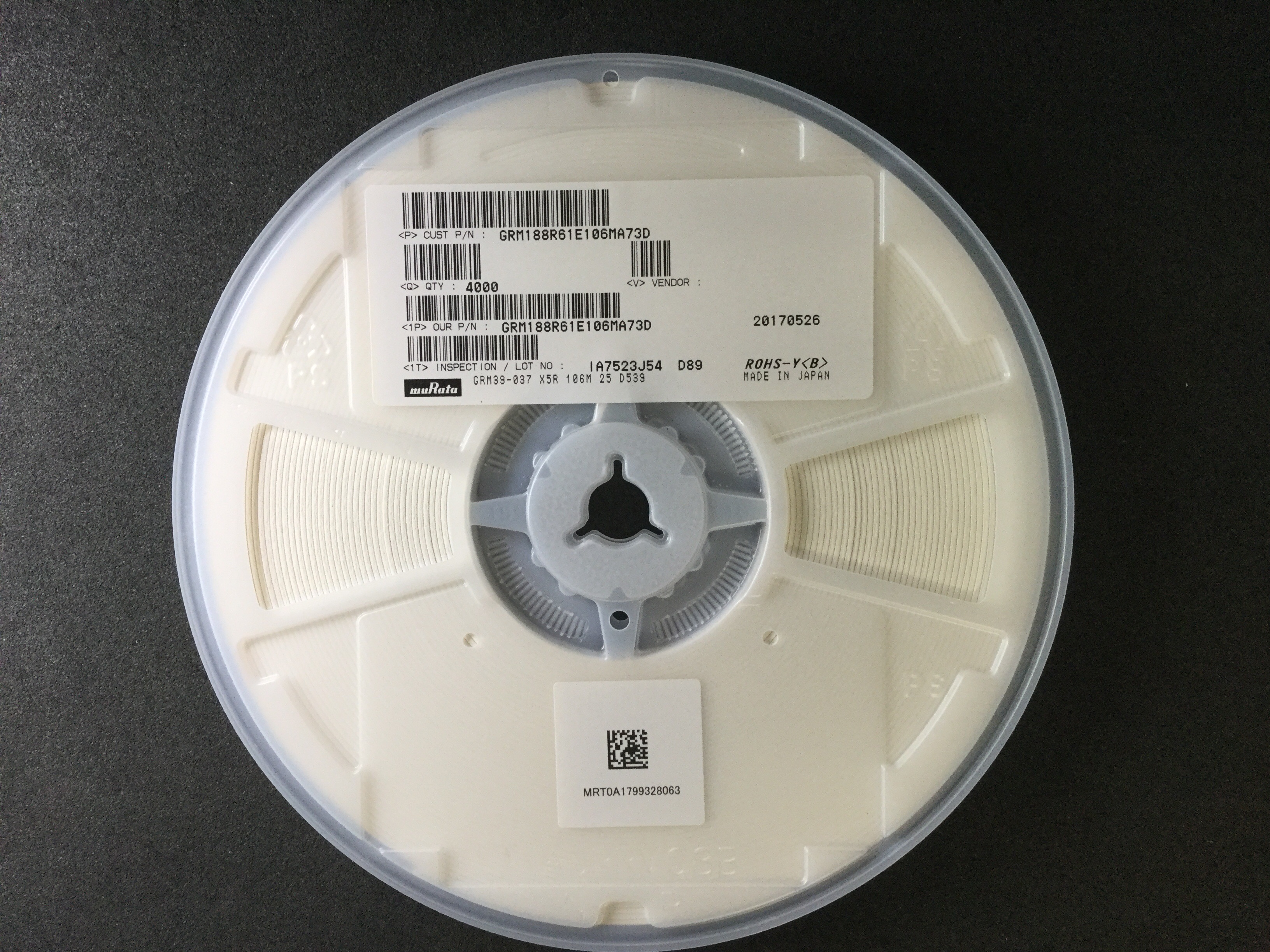 GRM188R61E106M